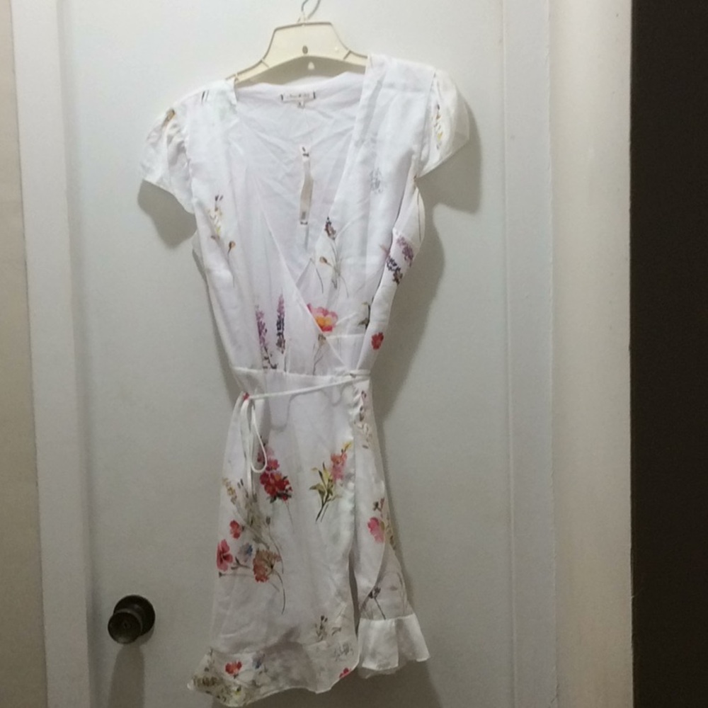 White Wrap Dress with capped Sleeves and flowers